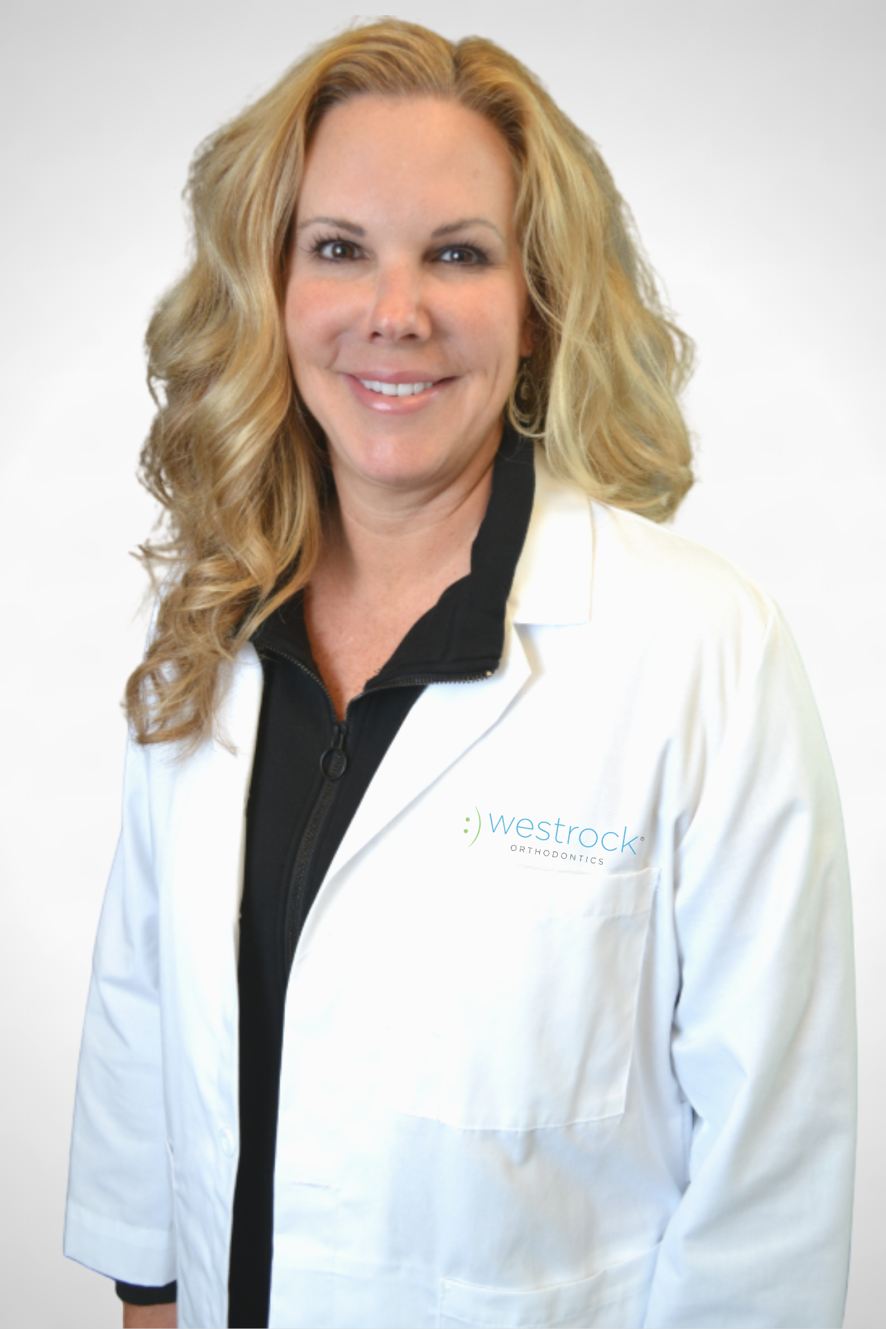 Dr. Susan Sherrick Headshot White Coat