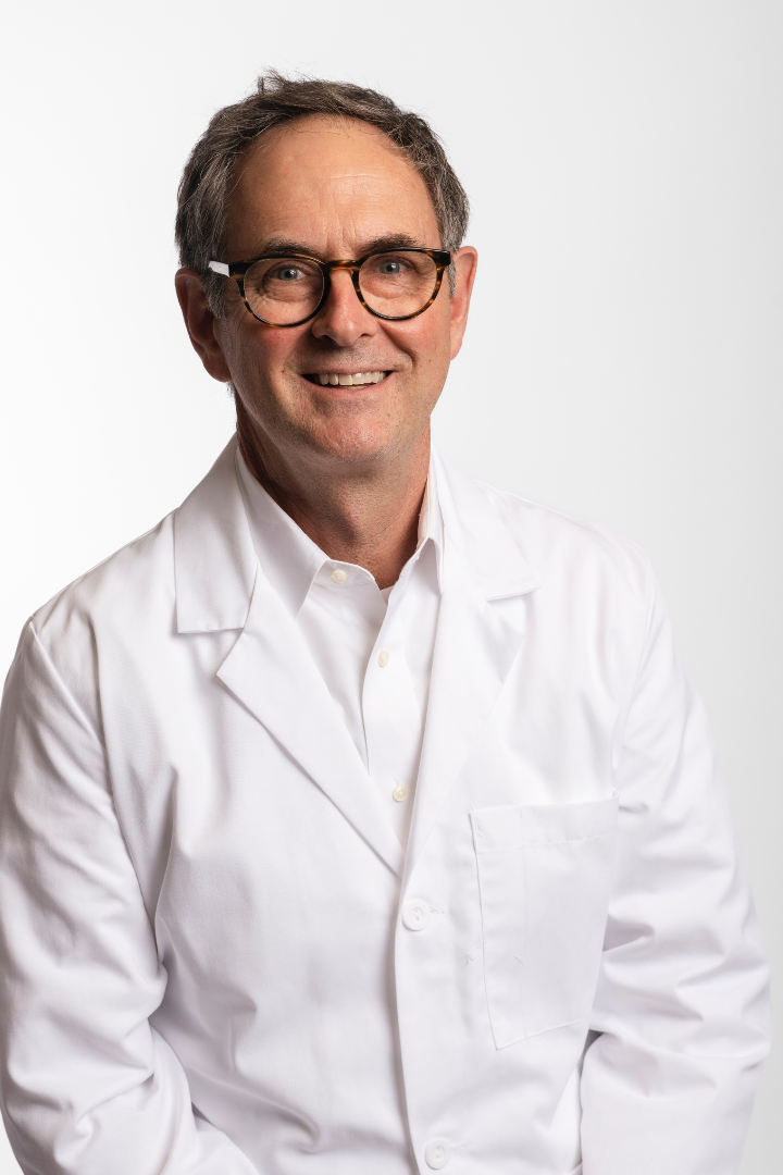 Dr. Stephen Mangan Headshot White Coat