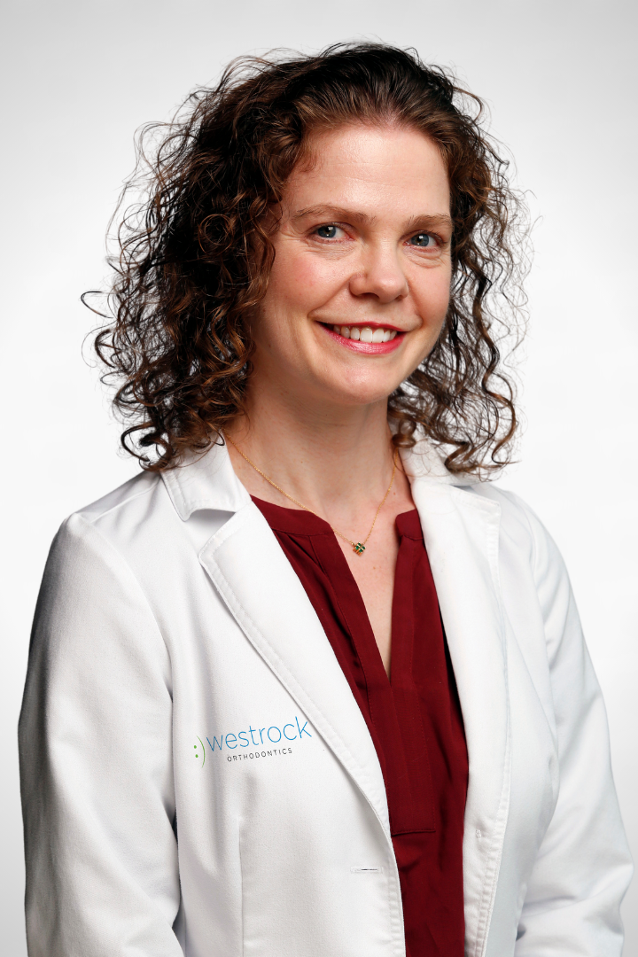 Dr. Courtney Atkinson Headshot White Coat